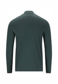 Långärmad polotröja i mörkgrön, tillverkad av slät tyg. Har en klassisk krage och en enkel, odekorerad baksidet design.