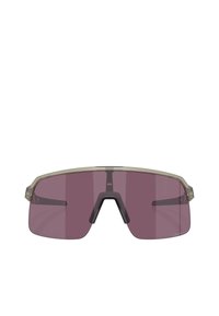 Occhiali da sole sportivi con montatura beige, grandi lenti viola sfumate e ponte nero. Design leggero, adatto per attività all'aperto.