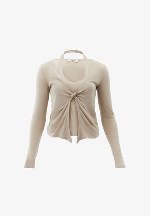Top beige a maniche lunghe con nodo frontale, tessuto morbido, scollo rotondo e design corto, con una finitura senza cuciture.