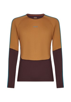 Maglietta a maniche lunghe girocollo marrone e senape con piping blu sulle maniche, logo "icebreaker" centrato sul petto.