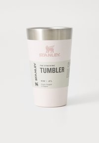 Stanley 16 oz pink and stainless steel stacking tumbler with branding and product information label on white background.