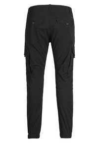 Black cargo pants with elastic ankle cuffs, side pockets, and back pockets. Made of sturdy fabric with a smooth texture and a fitted design.