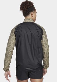 Adidas Terrex TRAIL - Cortaviento - savanna   focus olive