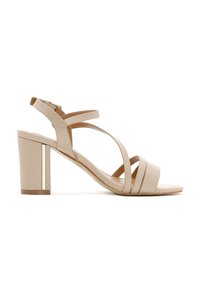 Beige high-heel sandal with a wide block heel, multiple straps, and a metallic accent on the heel. Smooth texture and open toe design.