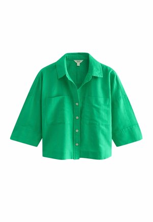 Zielona krótka koszula zapinana na guziki, z krótkimi rękawami, dwoma kieszeniami na piersi i spiczastym kołnierzykiem.