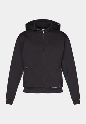 Fekete cipzáras kapucnis pulóver bélelt kapucnival, elülső zsebekkel, bordázott mandzsettákkal és egyenes aljjal. Puha, vastag anyagból készült, matt felülettel.