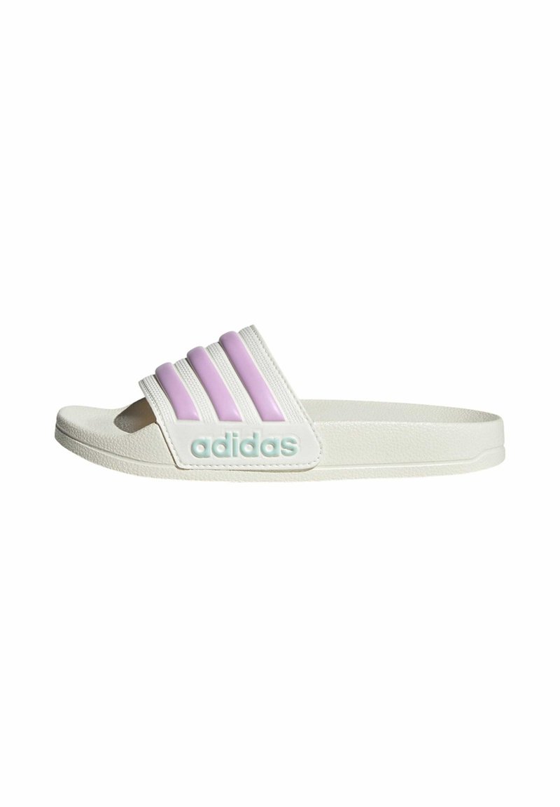 Adidas slide, white with three purple rubber stripes. Features a textured upper and a turquoise logo detail. Open-toe design.