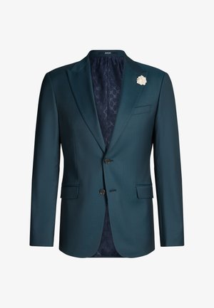 Męska marynarka w ciemnym kolorze morskim z dwoma guzikami, klapami typu notch, białą kwiatową przypinką, kieszeniami z patkami oraz wzorzystą, ciemnoniebieską podszewką.