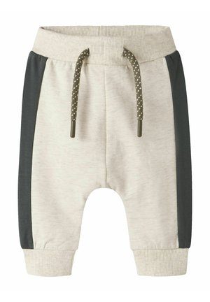 Lichtbeige joggingbroek met donkergrijze zijpanelen, geribbelde manchetten en een tailleband met trekkoord met gepolijste uiteinden en gestippelde patronen.