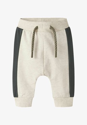 Lichtbeige joggingbroek met donkergrijze zijpanelen, geribbelde manchetten en een tailleband met trekkoord met gepolijste uiteinden en gestippelde patronen.