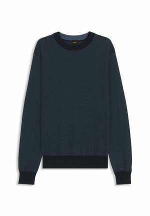 Suéter de punto azul oscuro con cuello redondo, puños y dobladillo acanalados. Presenta un patrón texturizado y detalles en contraste en el cuello.