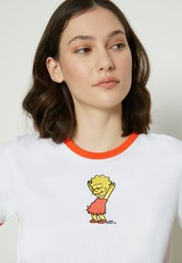 Levi's® LEVI’S® X THE SIMPSONS™ RINGER - Camiseta estampada - red/white