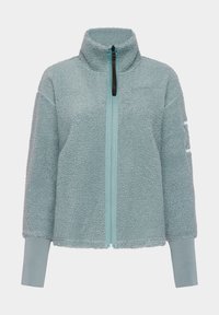 Fleece jack in lichtblauw met een hoge kraag, een rits aan de voorkant en geribde manchetten. Beschikt over een zachte, textuurrijke oppervlakte en merknaam op de mouw.