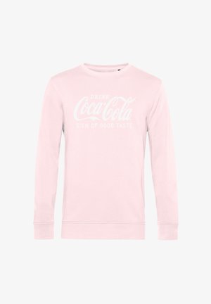 Felpa a maniche lunghe rosa chiaro con il testo bianco "Drink Coca-Cola Sign of Good Taste" centrato sulla parte anteriore.
