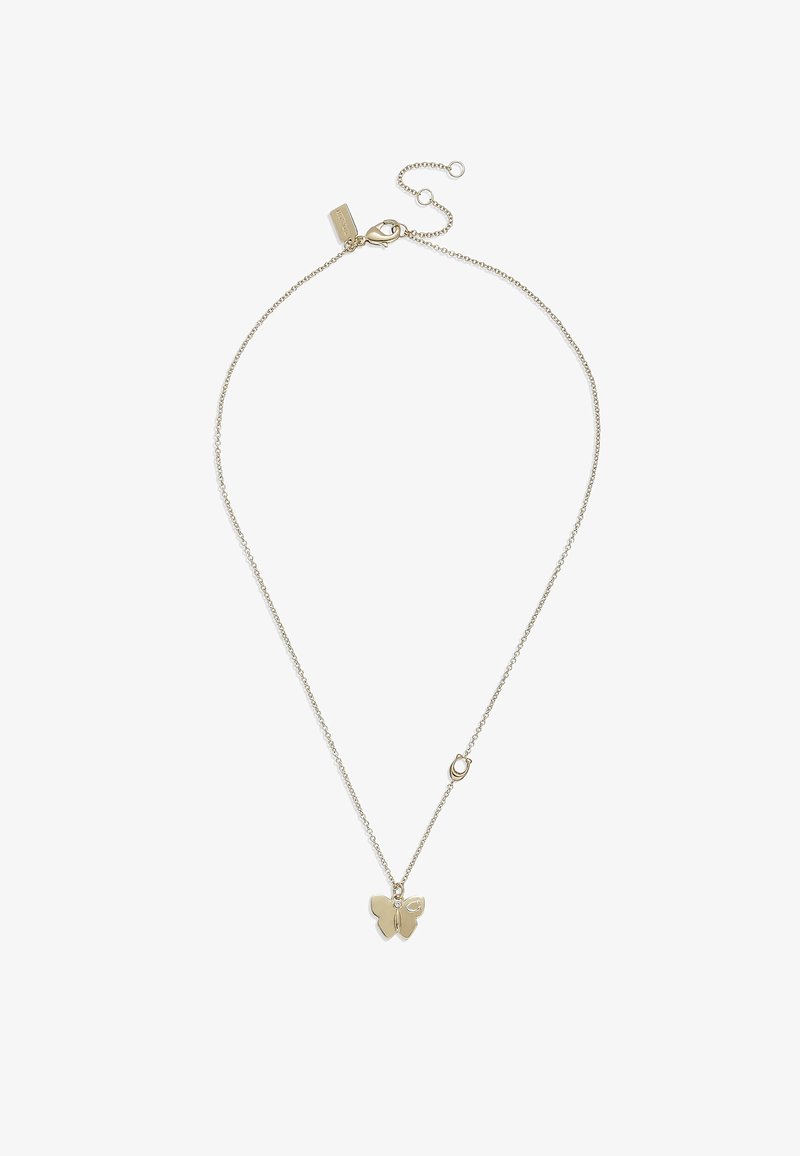 Collier délicat en chaîne d'argent avec un petit pendentif papillon et une fermeture réglable sur fond blanc.