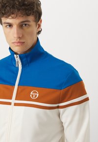 Sergio Tacchini DAMARINDO SET - Tepláková súprava - nautical blue/gardenia/mocha bisque
