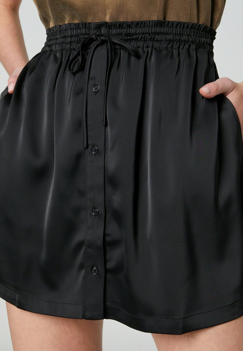 Damen Jeansröcke | Guido Maria Kretschmer Collection Minirock schwarz - RB90575 Damen Jeansröcke | Guido Maria Kretschmer Collection Minirock schwarz - RB90575