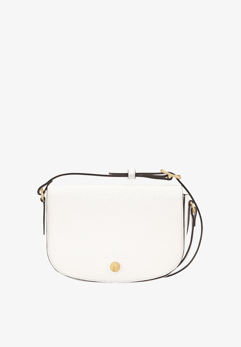 White pebbled leather crossbody bag with a rounded shape, black strap, gold hardware, and embossed logo detail on the front.