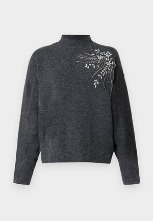 Mørk grå sweater med høj hals og lange ærmer. Har dekorative pynt af krystaller i et blomstermotiv på den ene side.