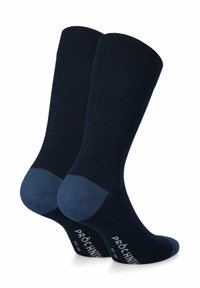Granatowe skarpetki z prążkowanym wzorem; kontrastujący jaśniejszy niebieski pięta i palce; wzmocnione szwy; logo nadrukowane z boku.