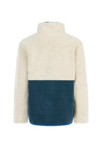 Fleece pullover in ivory and navy, featuring a textured upper and smooth lower panel, high collar, and blue trim at the hem.