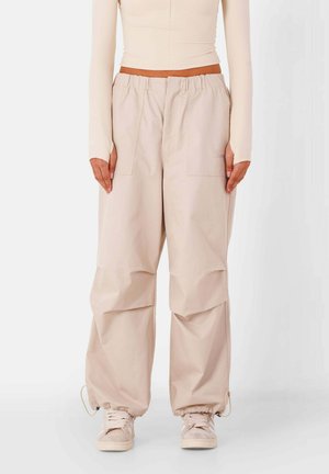 Trousers - beige