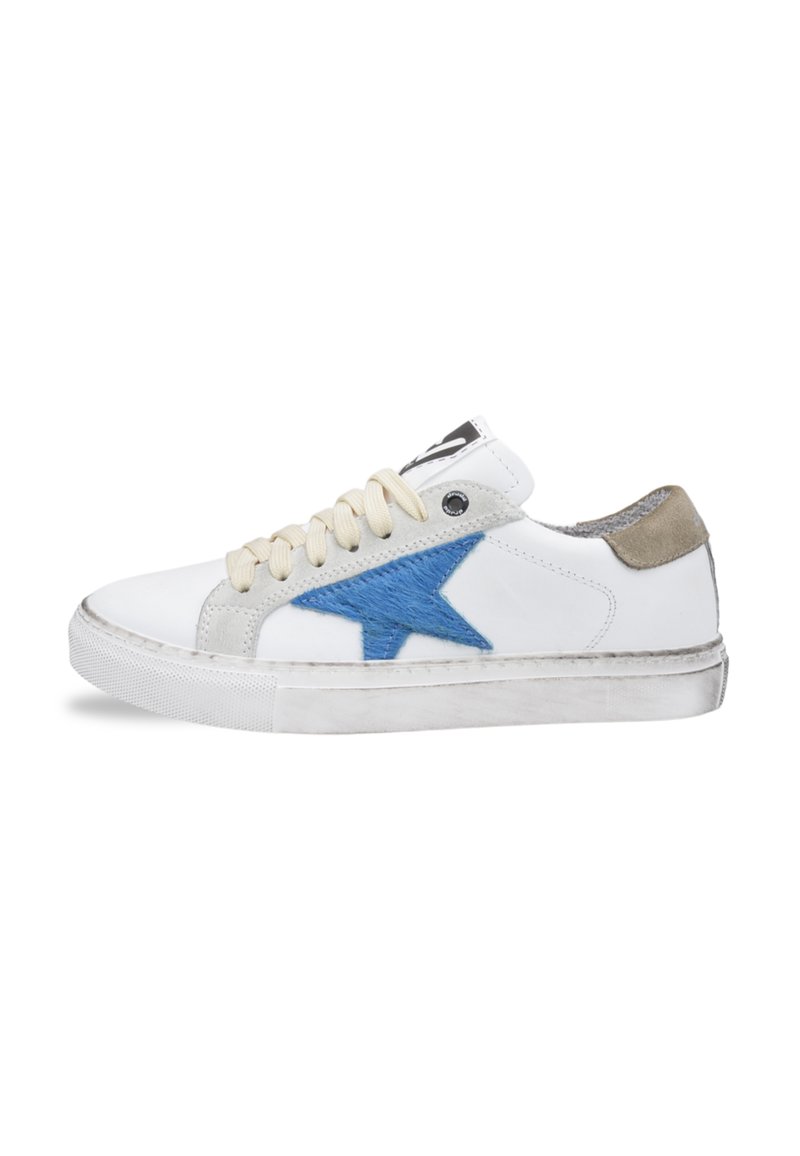 White leather sneakers with a blue embroidered star, beige accents, and cream laces. Textured rubber sole with slight scuffing.