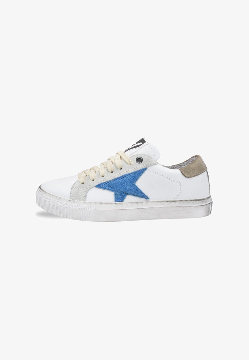 White leather sneakers with a blue embroidered star, beige accents, and cream laces. Textured rubber sole with slight scuffing.