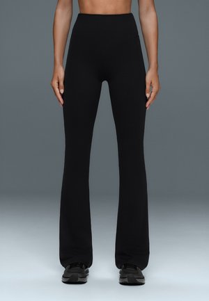 OYSHO, EVERMOVE HIGH RISE FLARE - Leggings - black