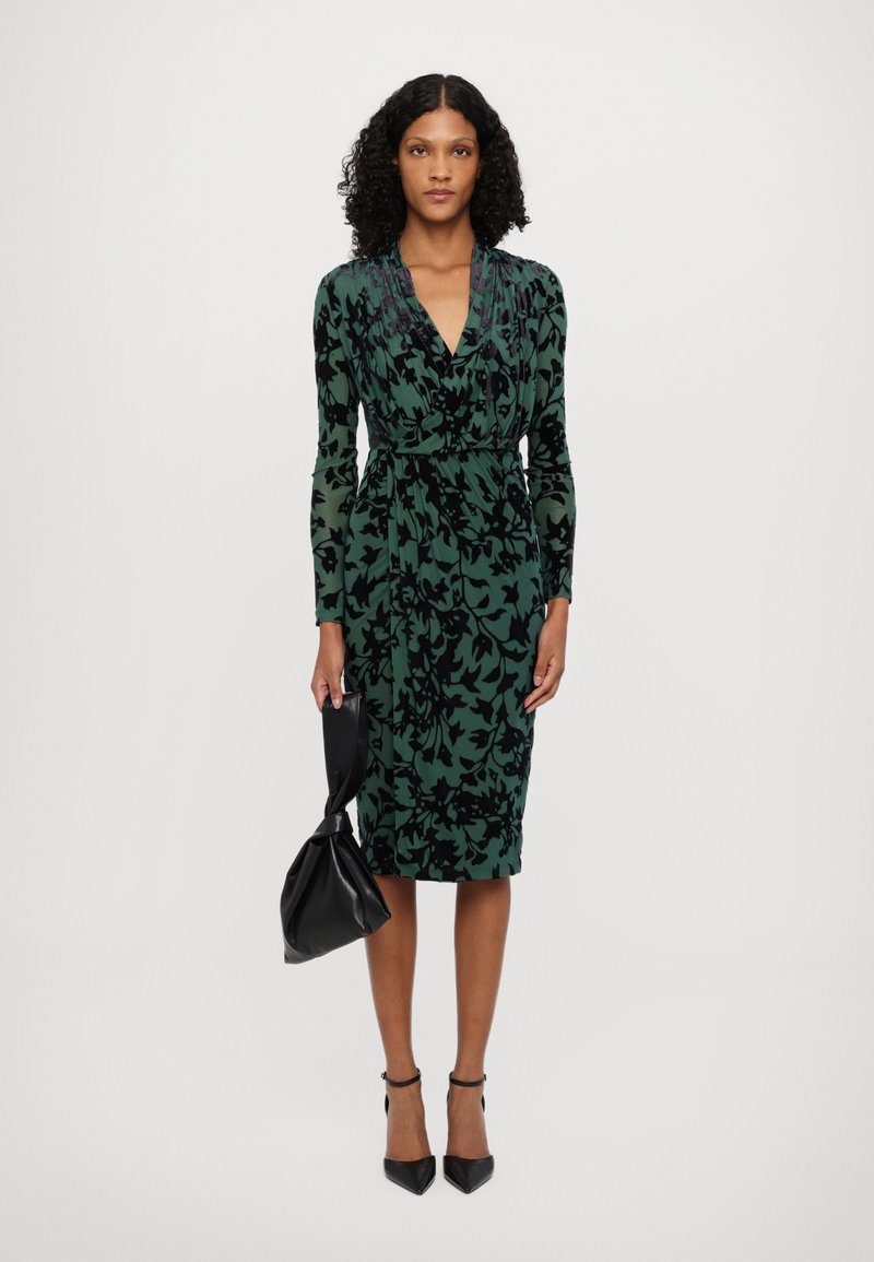 green dress and leopard print shoes Give Your All Green Leopard Dress – Shop the Mint main image 1