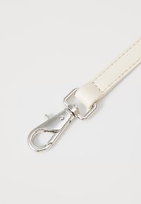 Tommy Jeans PILLOW MINI HOBO - Handbag - offwhite