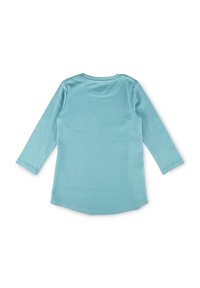 Long-sleeve light blue shirt shown from the back, laid flat on a white background.