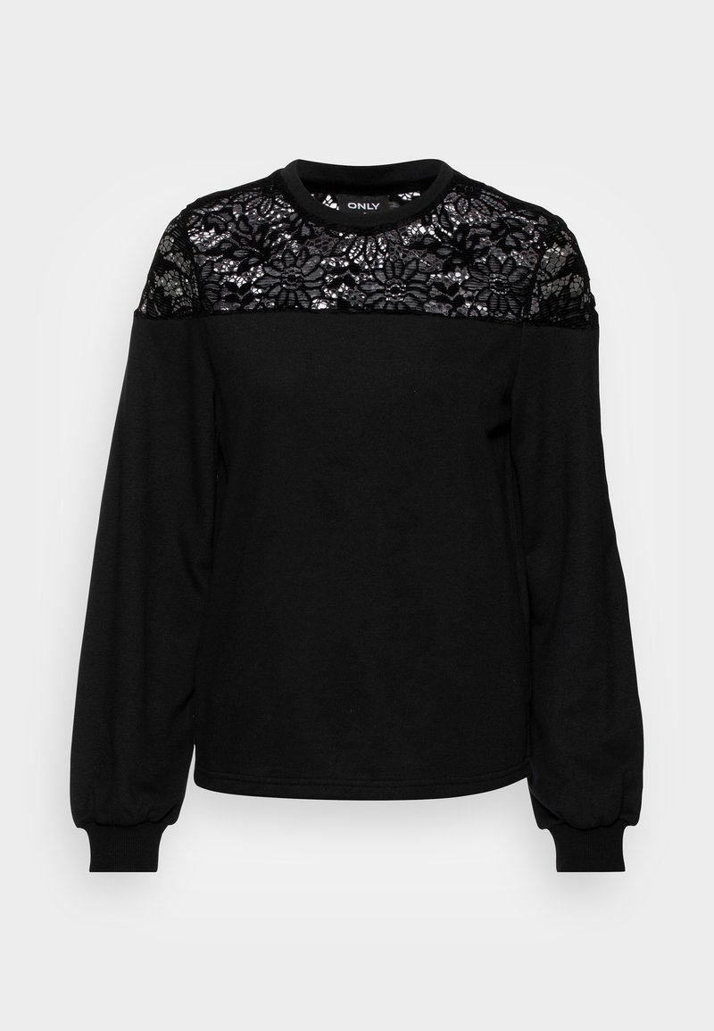 Sweatshirt noir avec un empiècement en dentelle à motifs floraux, manches longues avec poignets froncés, et encolure ronde. Texture de tissu douce.