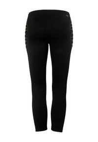 Leggings noirs ajustés, avec des accents de couture jaune sur les côtés. Taille élastique pour un confort optimal.