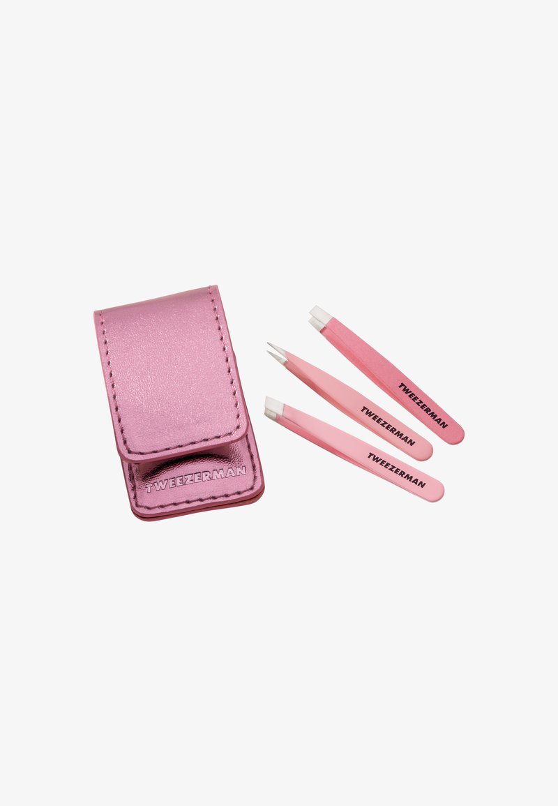 Set of three pink Tweezerman tweezers with different tips and a matching pink leather carrying case on a white background.