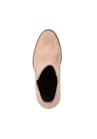 Botín de ante beige hasta el tobillo, con punta redondeada y paneles laterales elásticos. Textura suave con una suela de goma plana y un diseño minimalista.