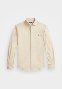 Beige shirt met lange mouwen en een button-down kraag, met een klein logo op de linkerborst en een glad, gestructureerd stof.