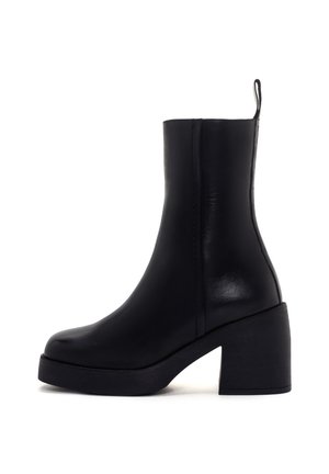 Black leather ankle boot with block heel and pull tab at the back, smooth finish, and rounded toe, photographed on white background.