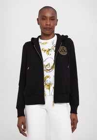 Versace Jeans Couture Športna jopa s kapuco na zadrgo - black/gold