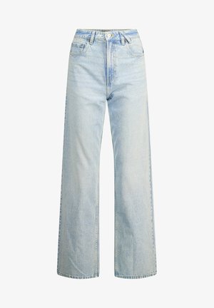 Jeans de tiro alto en denim de lavado claro, con un diseño clásico de cinco bolsillos y costuras en contraste. Corte de pierna recta y dobladillo deshilachado.