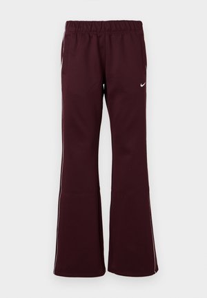Tumedad spordipüksid flared disainiga, elastse vöökoha ja küljetaskutega. Omab valget ääristust ja väikest logo ees.