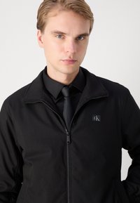 Calvin Klein Jeans HARRINGTON - Jas - black