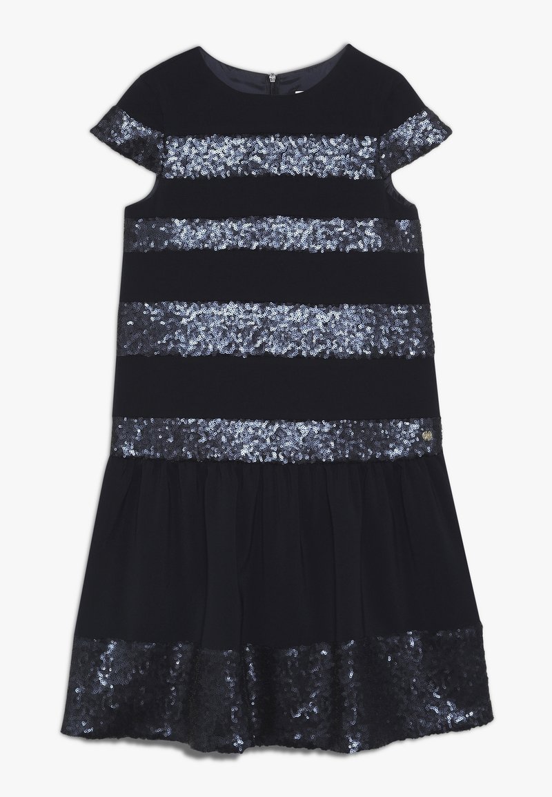 Robe noire à manches courtes avec des rayures horizontales en sequins argentés et un ourlet de jupe froncé décoré de sequins argentés.