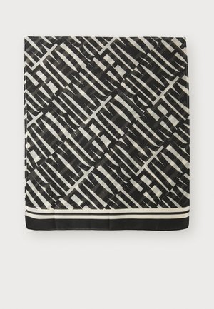 Schwarz-weiß gemusterter Schal mit geometrischem Design, kontrastierenden Streifen und einem einfarbigen schwarzen Rand am unteren Ende.