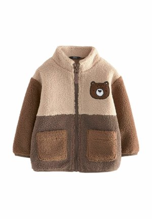 Veste en polaire zippée pour enfant en blocs de couleurs beige, marron et sable, avec poches avant et un patch visage d'ours sur la poitrine.