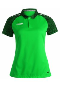 Groene polo met korte mouwen, zwart patroon op de schouders en een kraag. Bevat het 'JAKO' logo aan de voorkant en heeft een rechte zoom.