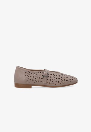 Beige flats with perforated pattern, featuring a side buckle accent. Rounded toe and low heel provide a comfortable silhouette.