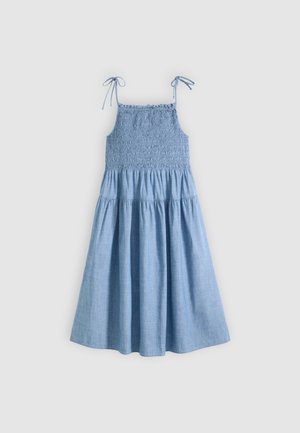 Robe midi sans manches bleu clair avec corsage froncé, jupe à volants et bretelles réglables à nouer aux épaules.