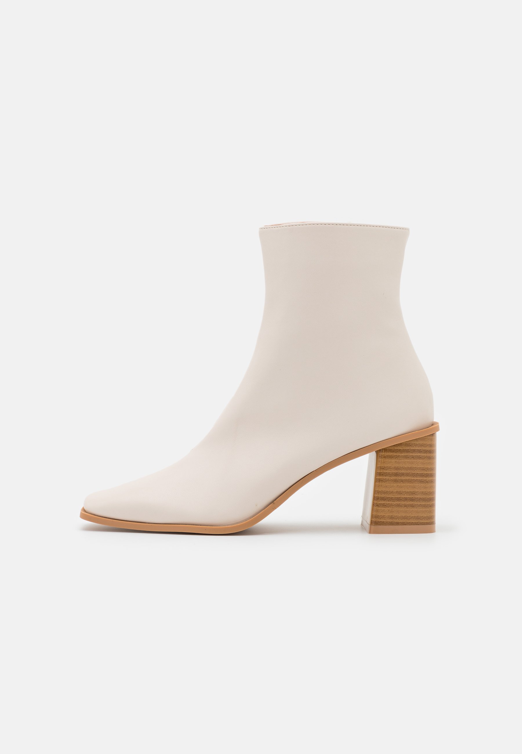 white flat ankle booties