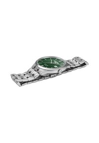 Orologio in acciaio inox argentato con quadrante verde, indicatori delle ore argentati e display per la data. Presenta un cinturino in metallo e una cassa rotonda.